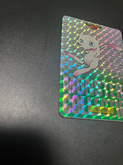 1996 Bandai Pokemon Monster Collection Mew trading card with green background
