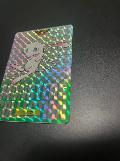 1996 Bandai Pokemon Monster Collection Mew trading card with green background
