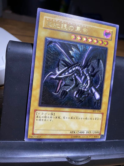 Yugioh Crimson Eye Black Dragon monster card 301-056 Level 7 Dark Dragon ultimate rare