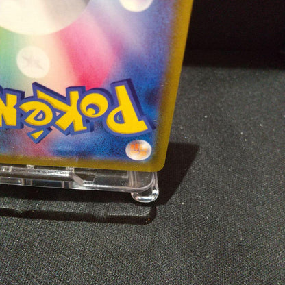 Pokemon Card Mewtwo V P showing front design with minor flaws in near mint condition