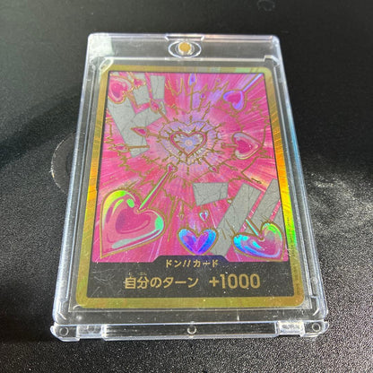 One Piece Card Game Don Card with heart-pattern hologram featuring Hancock in gold hologram design