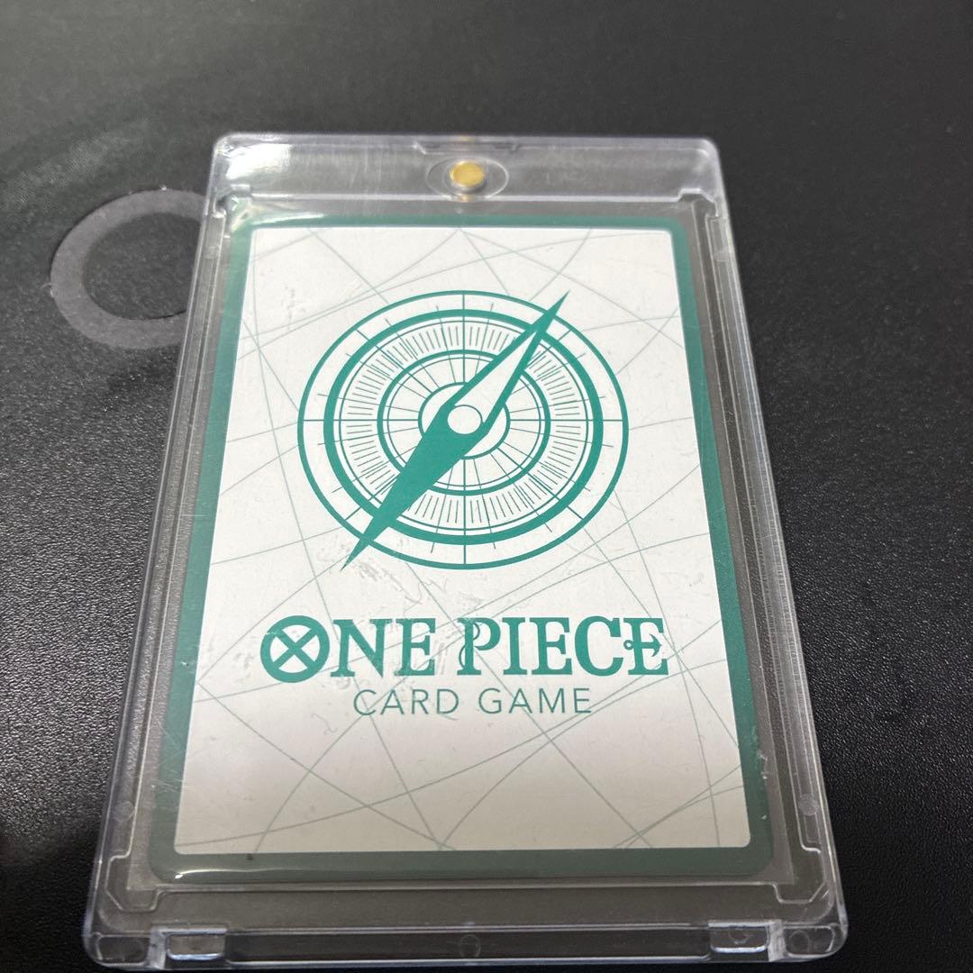 One Piece Card Game Don Card with heart-pattern hologram featuring Hancock in gold hologram design
