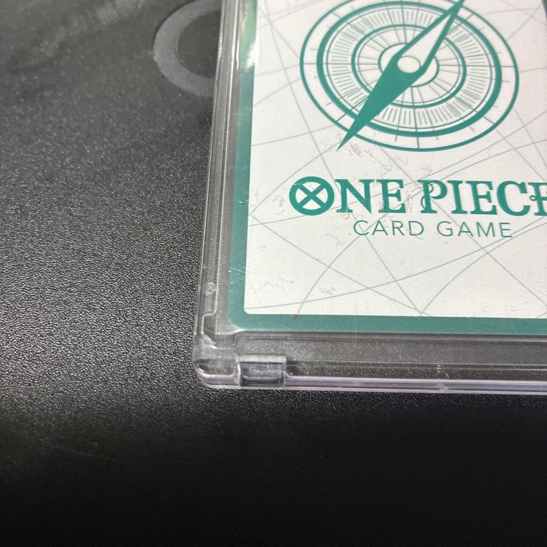 One Piece Card Game Don Card with heart-pattern hologram featuring Hancock in gold hologram design