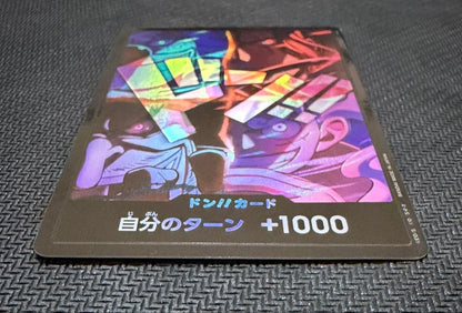 One Piece Fourth Emperor Don Card showing Shanks, Teach, Luffy with visible scratches and paint loss