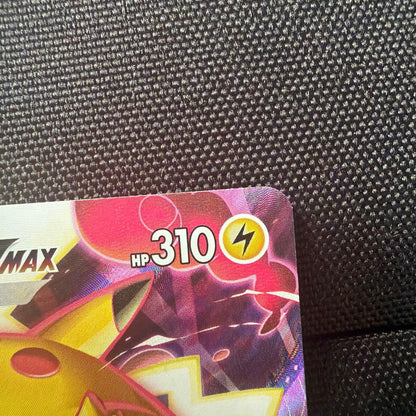 Nintendo Pikachu VMAX CSR S8b Pokemon collectible card showing front with slight edge wear