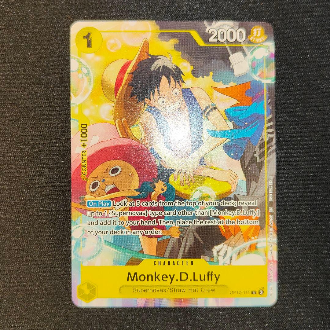 Anime Monkey D Luffy Welcome Pack Promo card showing fine fiber edges stored in protective sleeve