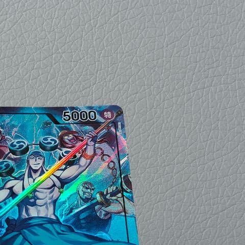 One Piece Energy Leader Parallel trading card in sleeve with Japanese text and colorful artwork
