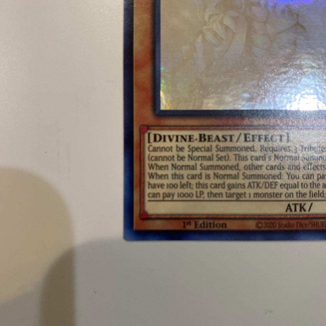 Bandai Yu-Gi-Oh Ra's Winged Dragon of Horus Ghost Rare card North America Edition in protective sleeve