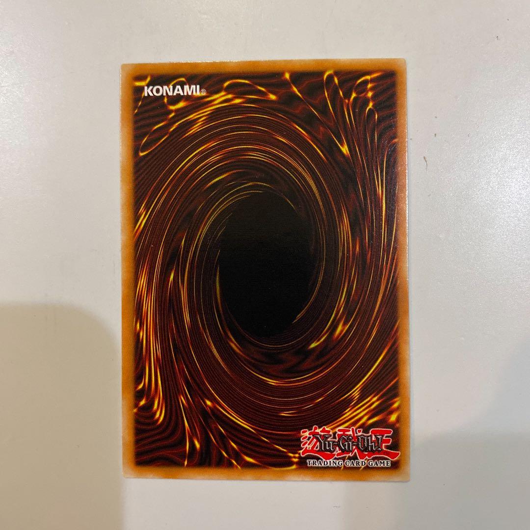 Bandai Yu-Gi-Oh Ra's Winged Dragon of Horus Ghost Rare card North America Edition in protective sleeve