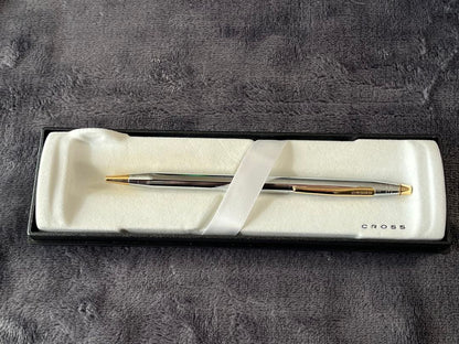 Cross Classic Century ballpoint pen with chrome body and gold-plated clip and accents in a gift box
