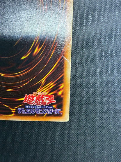 Blue-Eyes White Dragon Yu-Gi-Oh! trading card in early condition with visible signs of use
