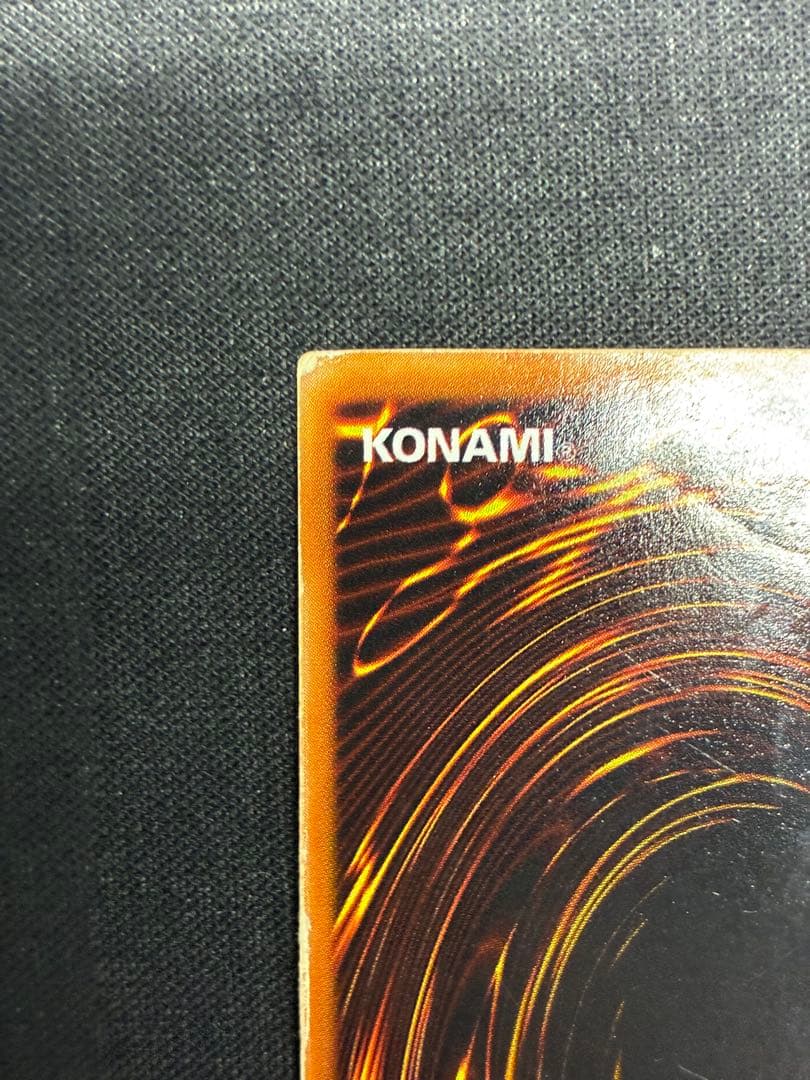 Blue-Eyes White Dragon Yu-Gi-Oh! trading card in early condition with visible signs of use