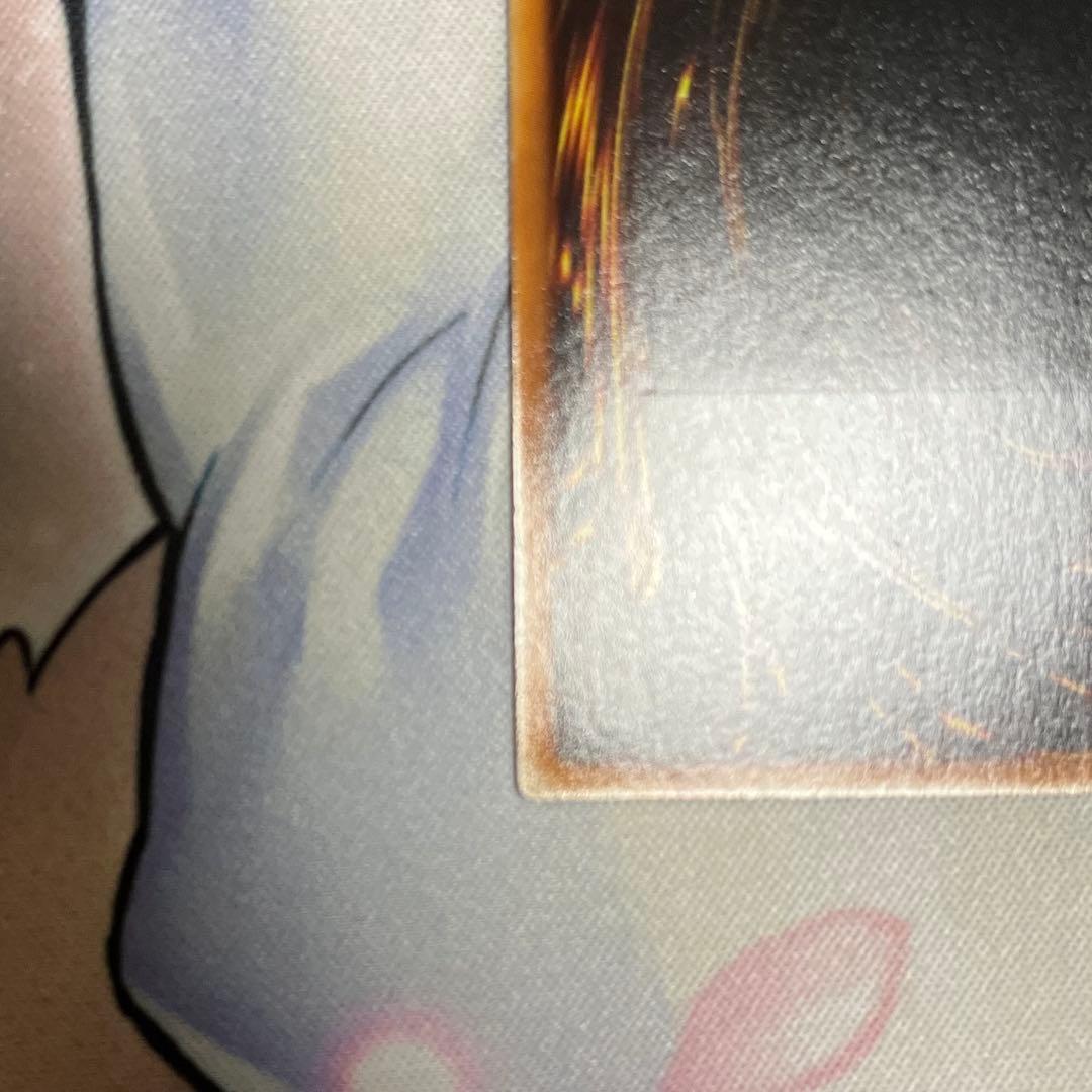 Yu-Gi-Oh! Supreme King Rainbow Dragon relief card showing fold line and minor scratches