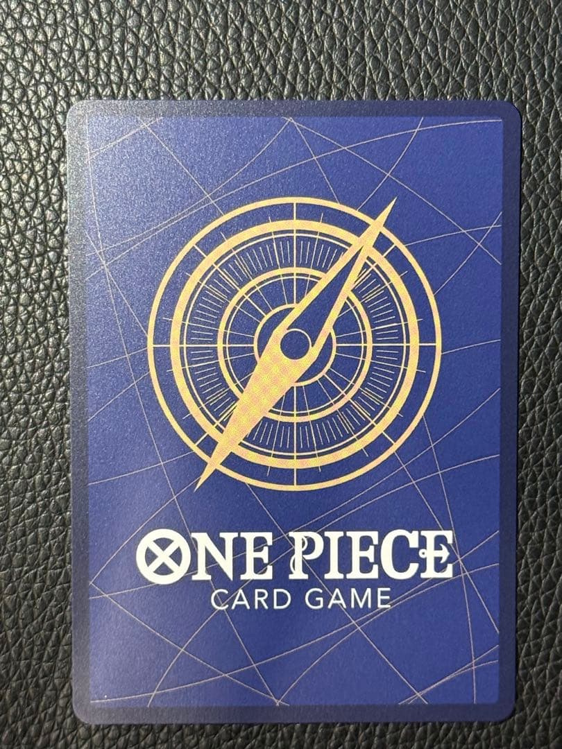 One Piece Marshall D. Teach collectible card stored in a protective sleeve displayed against white background