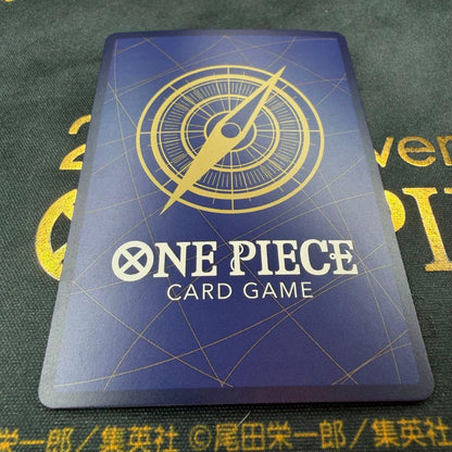 One Piece OP13-007 SR parallel figure card showing Ace, Sabo, and Luffy in PSA sleeve