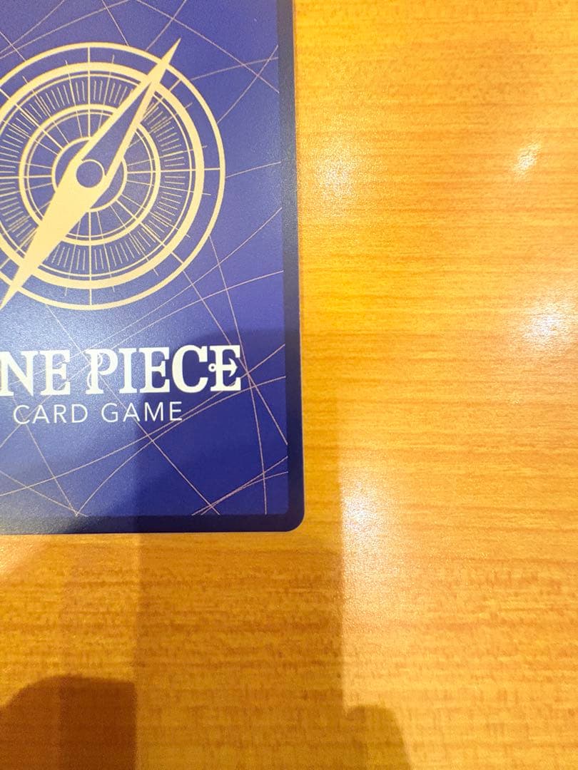 Sealed Portgas D. Ace rare SEC Series model OP07-119 collectible One Piece card in open sleeve