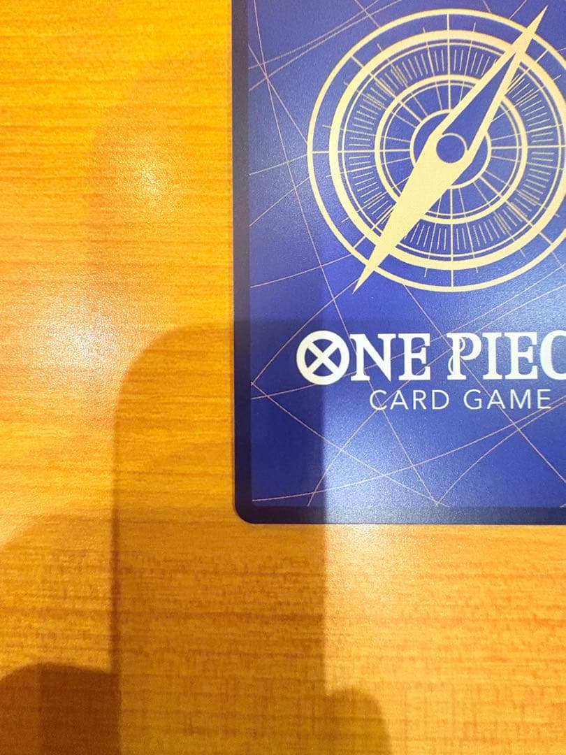 Sealed Portgas D. Ace rare SEC Series model OP07-119 collectible One Piece card in open sleeve