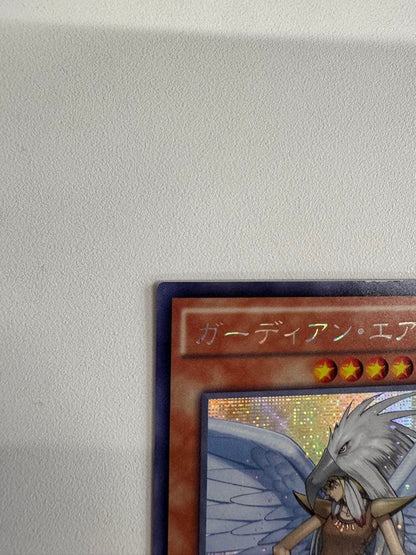 Yugioh Guardian Eatos Secret Asia Edition rare trading card with visible initial marks from overseas production