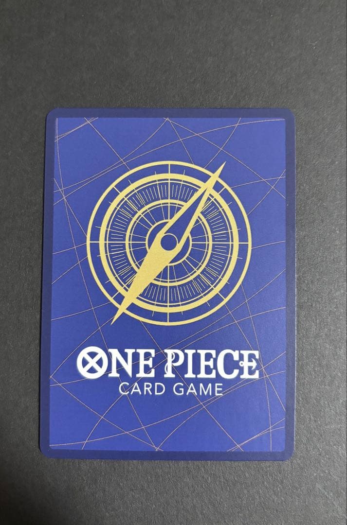 One Piece Monkey D. Luffy P-043 collectible card removed from binder with minor wear