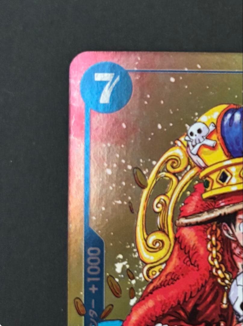 One Piece Monkey D. Luffy P-043 collectible card removed from binder with minor wear