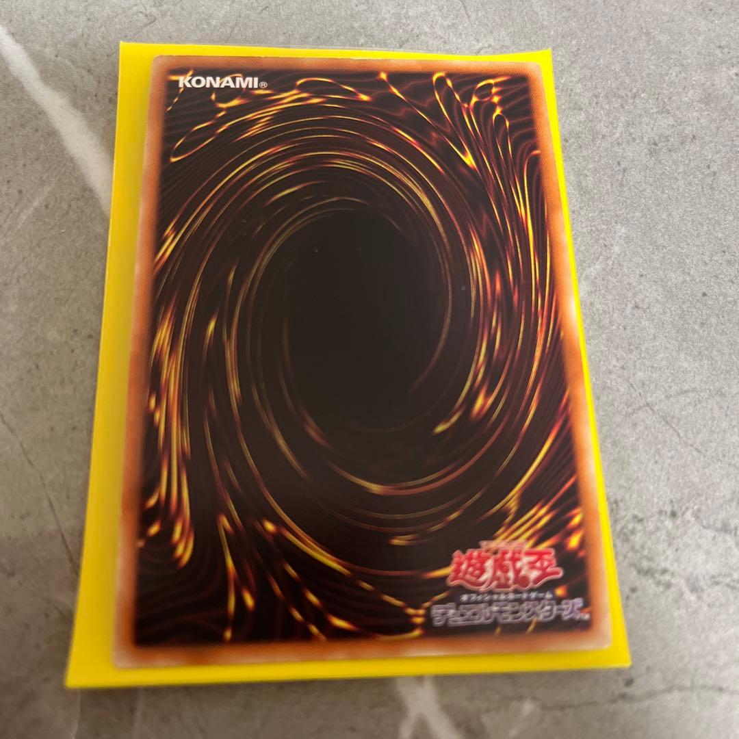Lavalval Chain DT Secret Yu-Gi-Oh card showing Fire attribute with visible wear and scratches