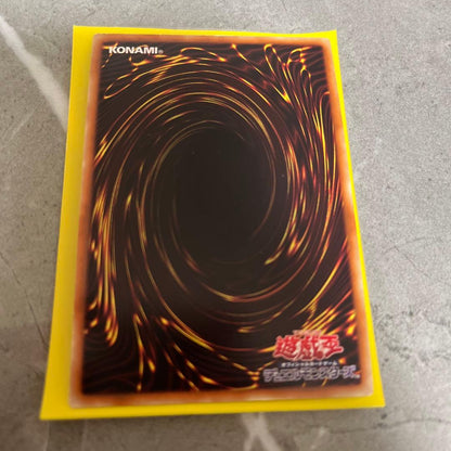 Lavalval Chain DT Secret Yu-Gi-Oh card showing Fire attribute with visible wear and scratches