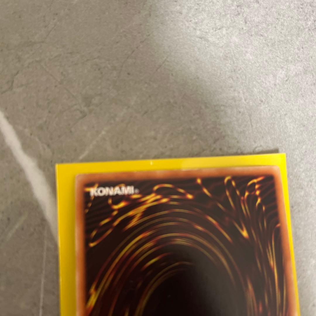 Lavalval Chain DT Secret Yu-Gi-Oh card showing Fire attribute with visible wear and scratches