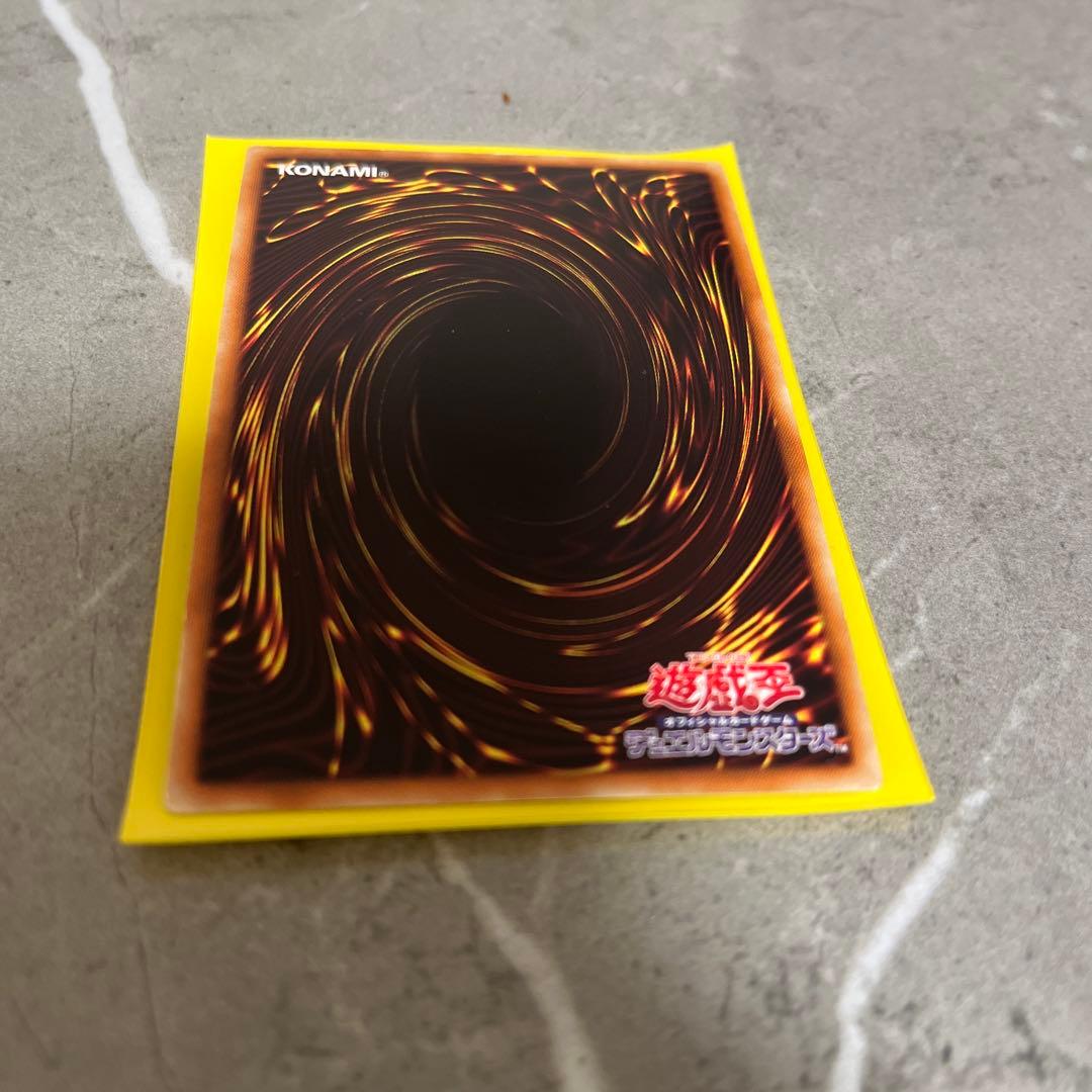 Lavalval Chain DT Secret Yu-Gi-Oh card showing Fire attribute with visible wear and scratches