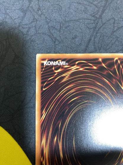 Used Yu-Gi-Oh Aromelus the Wormuedemy 20th Anniversary trading card with minor scratches and white chipping
