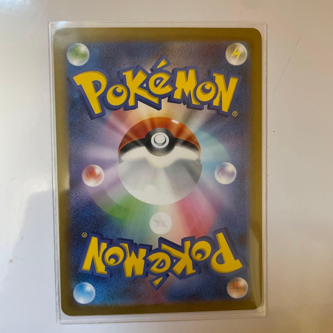 Pokemon Card Erika's Invitation SR stored in a sleeve with no visible scratches