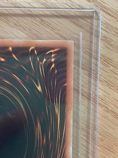 Yu-Gi-Oh Galaxy Eyes Afterglow Dragon 20th trading card with visible scratches and wear in protective loader