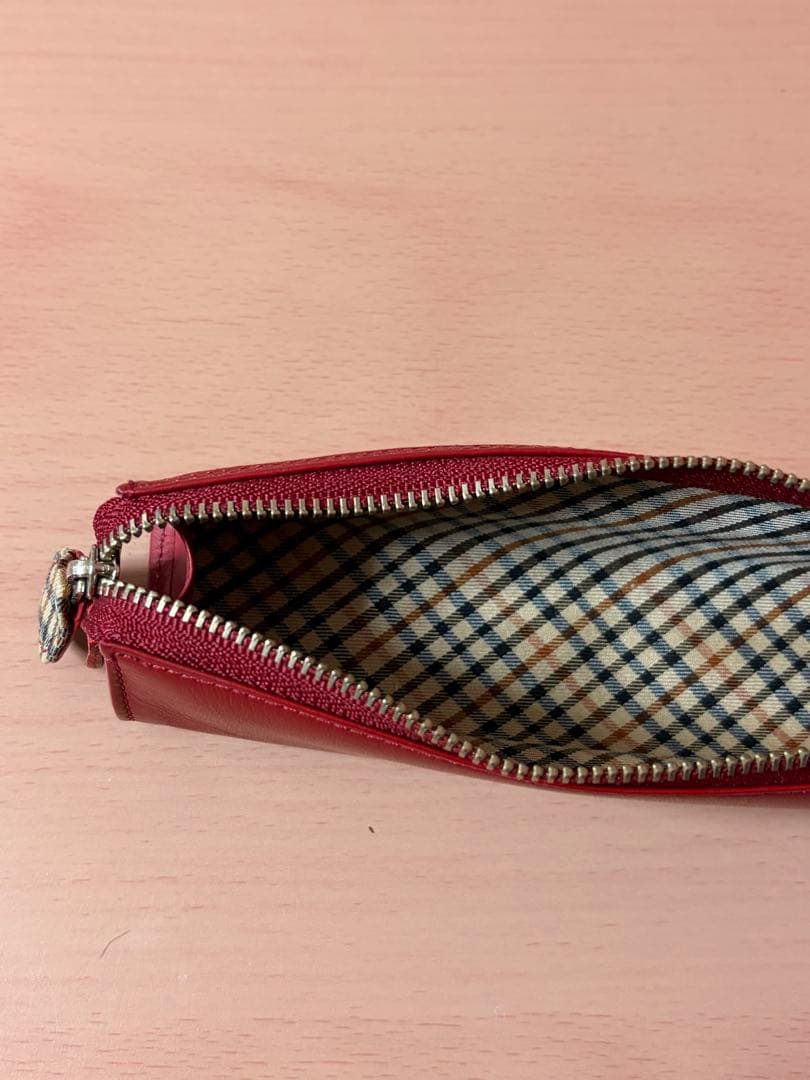 Red Daks House Check Cross Line pen case in excellent condition with no scratches or stains