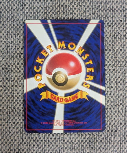 Bandai Mewtwo First Edition Expansion Pack old version card showing signs of aging without major scratches