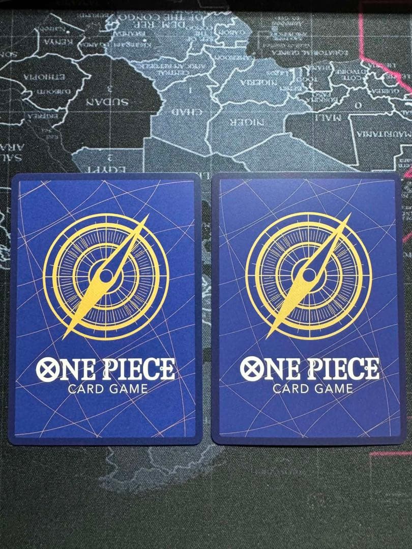 Two One Piece OP05 SR Japanese trading cards featuring Roronoa Zoro character from One Piece series