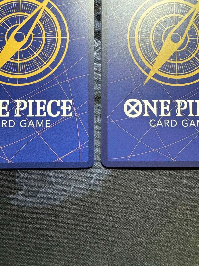 Two One Piece OP05 SR Japanese trading cards featuring Roronoa Zoro character from One Piece series