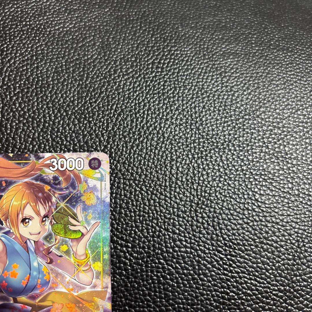 Limited edition One Piece Bandai OP06-101 R parallel trading card featuring Nami from Japan import