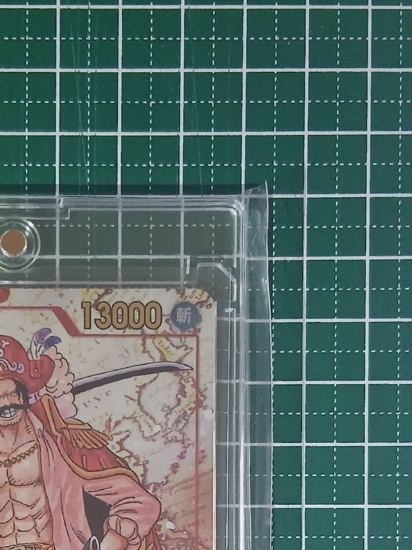 Bandai Goal D Roger SEC-P OP09-118 secret rare collectible card with gold super parallel artwork