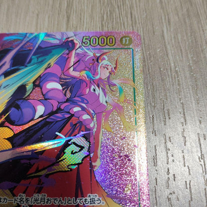 One Piece Yamato secret rare trading card OP01-121 with slight crease and white stain on back