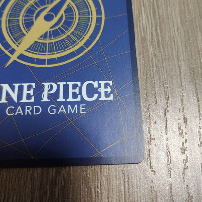 One Piece Yamato secret rare trading card OP01-121 with slight crease and white stain on back