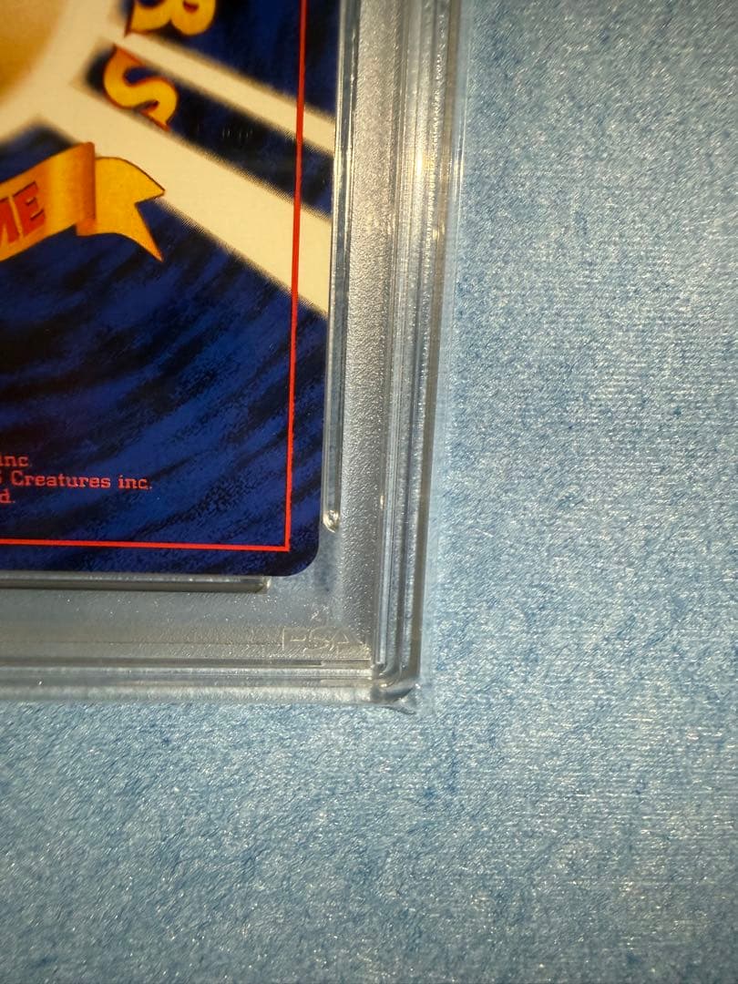 Pokemon Center Goblin Old Back trading card graded PSA 9 in protective case