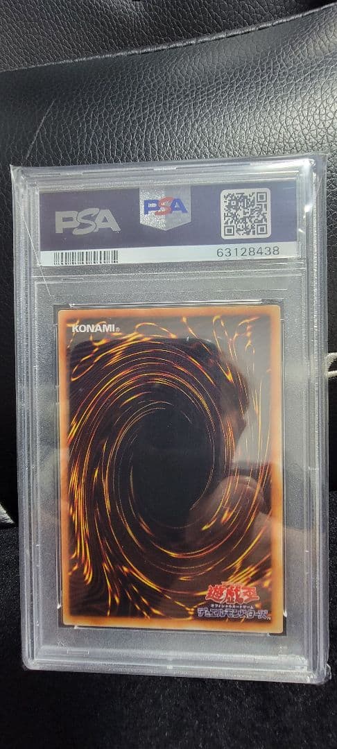 Yu-Gi-Oh! E Hero Chaos Neos Relief PSA 10 graded card with protective case showing minor scratches