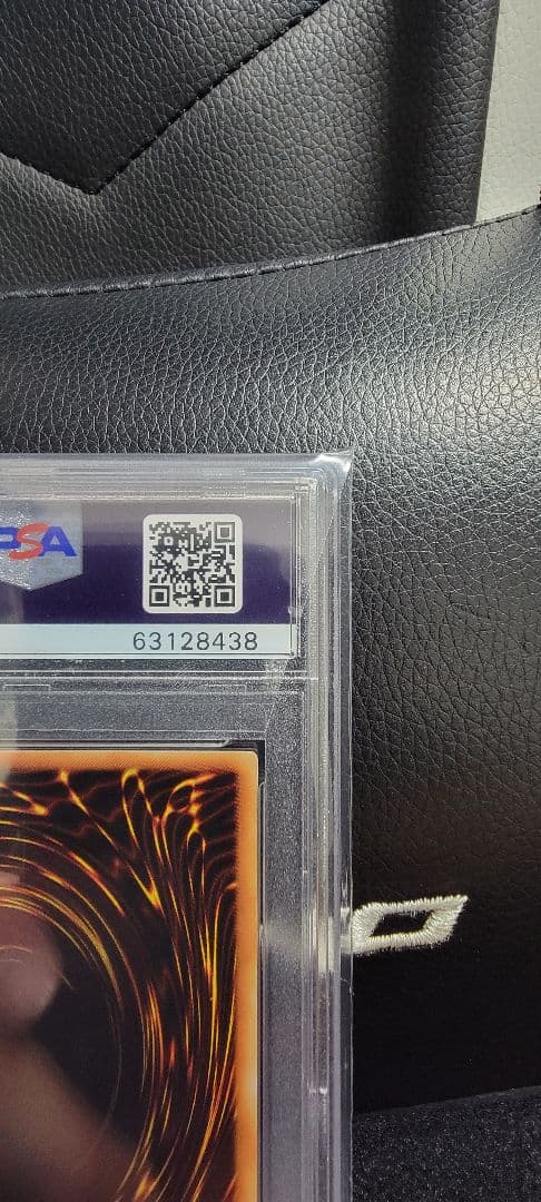 Yu-Gi-Oh! E Hero Chaos Neos Relief PSA 10 graded card with protective case showing minor scratches