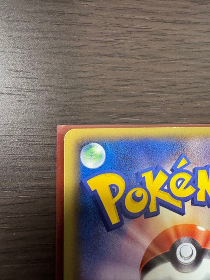 Pokemon Card Pikachu BW UR 1st Edition vintage Japanese collectible with minor surface scratches and white nick on back
