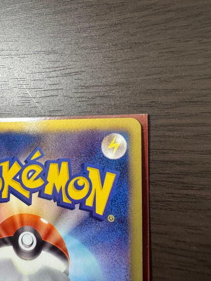 Pokemon Card Pikachu BW UR 1st Edition vintage Japanese collectible with minor surface scratches and white nick on back