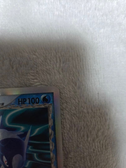 Pokemon card Delta Rayquazaex δ from 2006 Saitye no Kôbô PCG series, first edition, showing some use signs