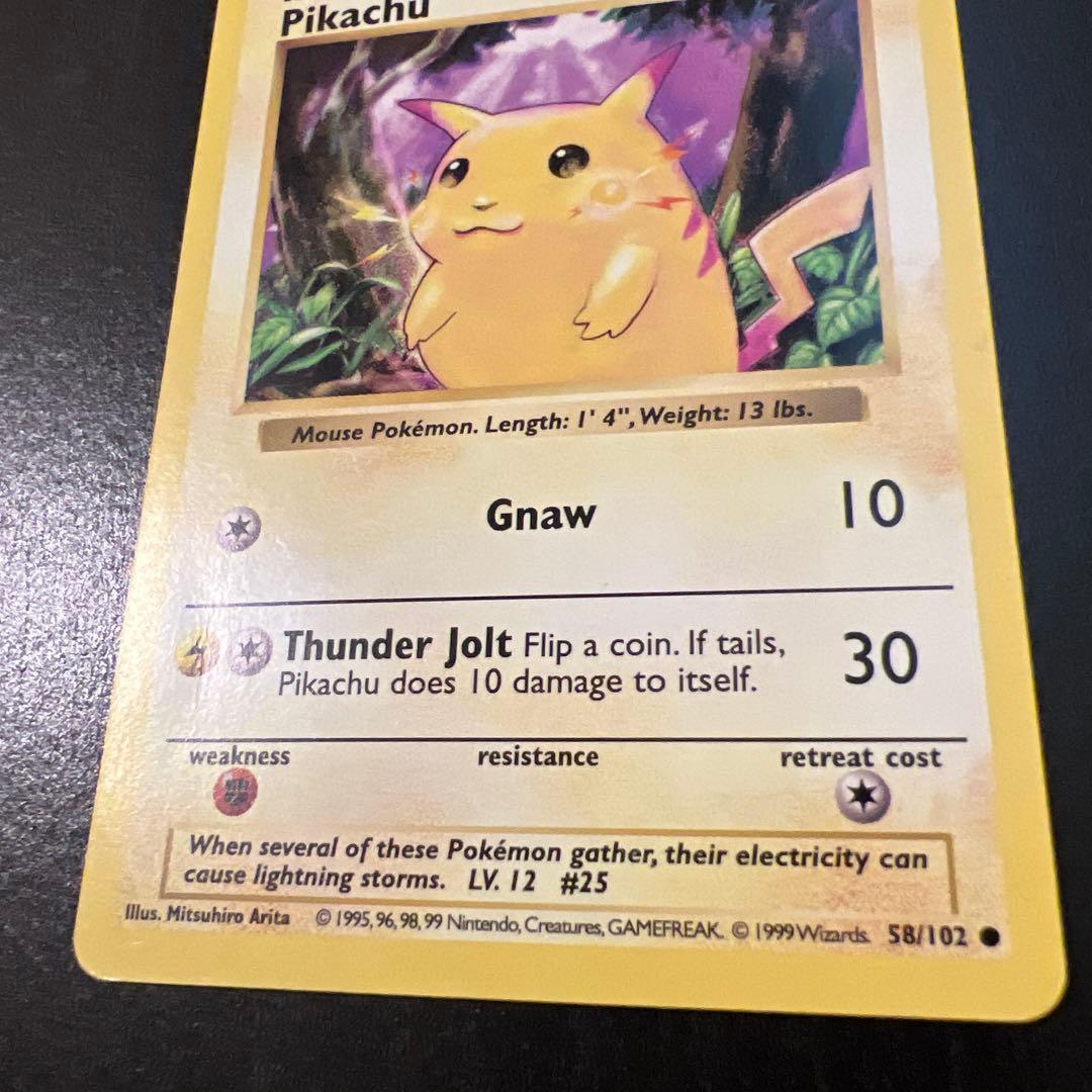 Vintage Pokemon Pikachu card 58/102 English version with minor scratches and whitening on back