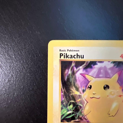Vintage Pokemon Pikachu card 58/102 English version with minor scratches and whitening on back