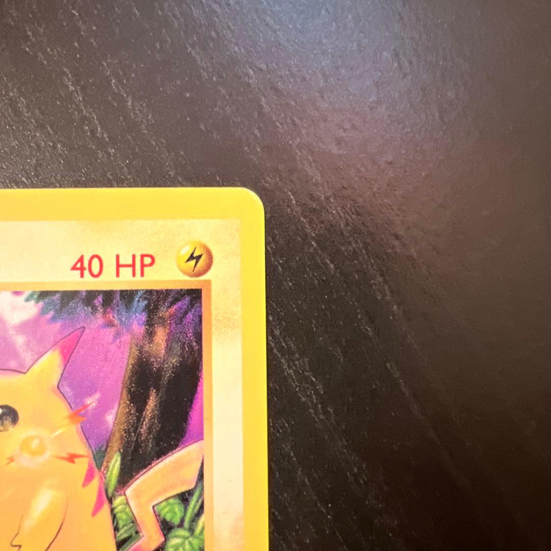 Vintage Pokemon Pikachu card 58/102 English version with minor scratches and whitening on back