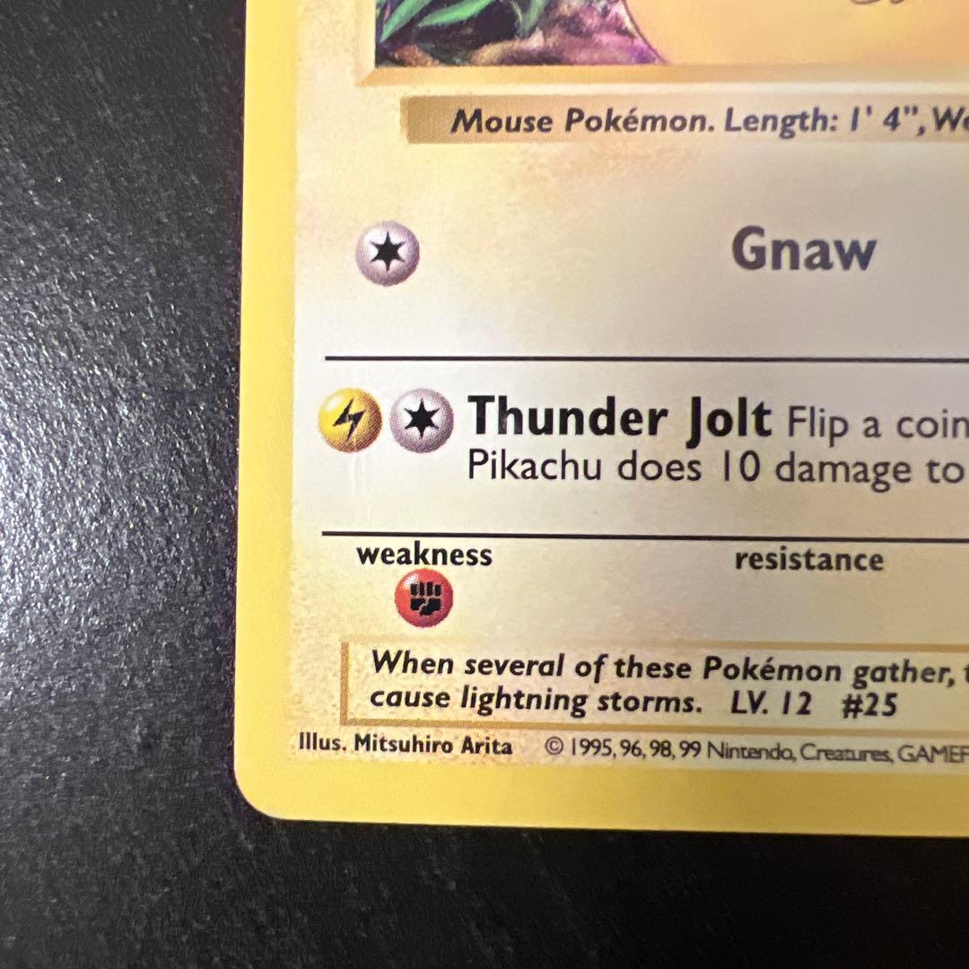 Vintage Pokemon Pikachu card 58/102 English version with minor scratches and whitening on back