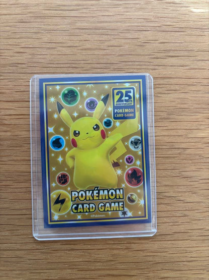 M Rayquaza EX Pokemon card from 25th Anniversary promotional pack in protective sleeves